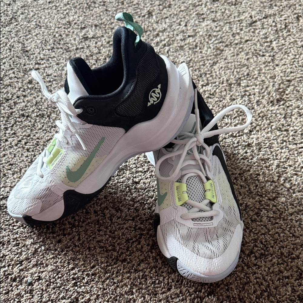 Nike Kids' White and Black Basketball Sneakers with Green Accents